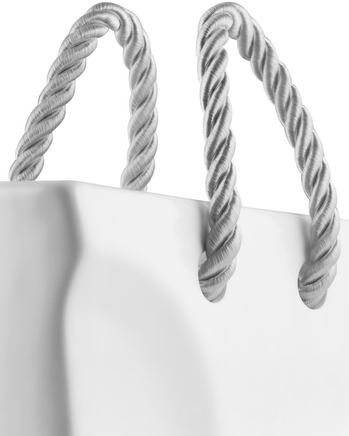 Top-down view of an empty white ceramic handbag vase on marble, minimalist tote bag flower vase