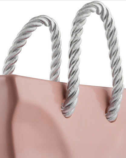 Top-down view of an empty beige ceramic handbag vase, minimalist tote bag flower vase
