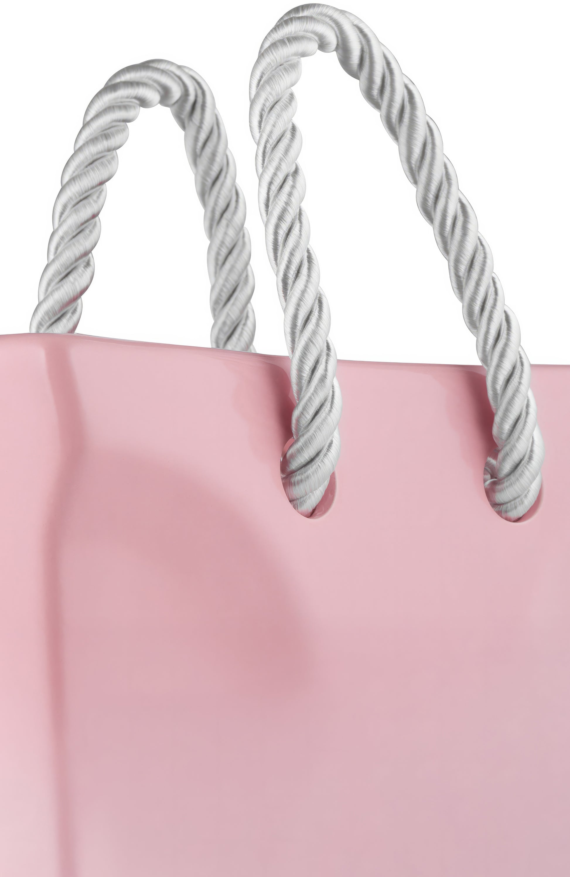 Top-down view of an empty blush pink ceramic handbag vase, coquette tote bag flower vase